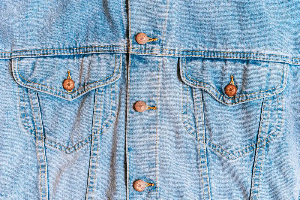 Close up of a repaired outdoor jacket seam